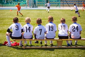 Kinderen in voetbalelftal