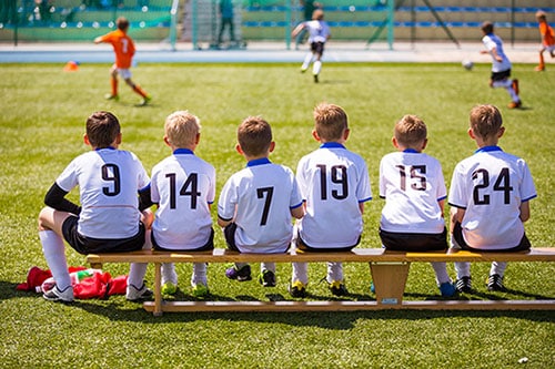 Kinderen in voetbalelftal